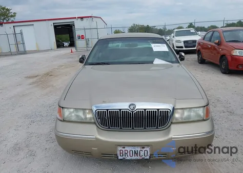 1999 Mercury Grand Marquis Gs z USA, uszkodzony, nr VIN 2MEFM74W2XX701994
